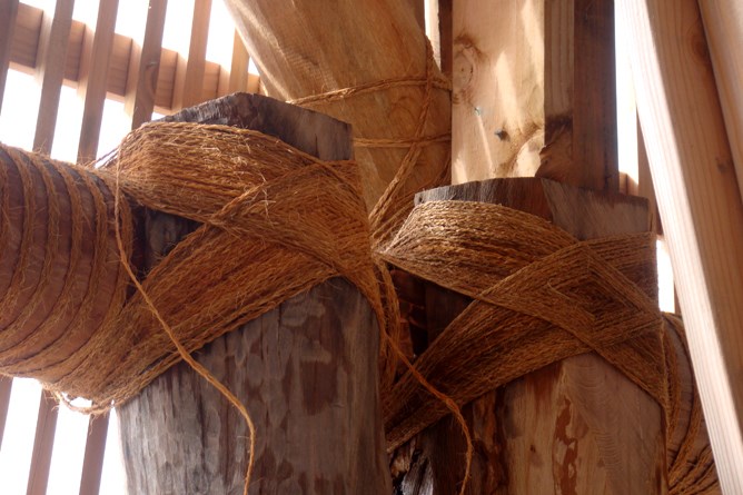Hand-woven coil of coconut fibers -- sennit, used to tie up lumber used for fale framing structures.