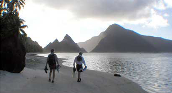 Beachwalkers with snorkle gear at Ofu Beach.