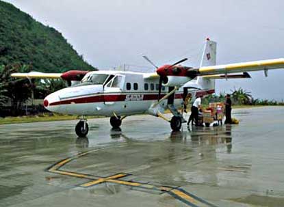 Twin otter aircraft offers irregular air service to the outer islands.