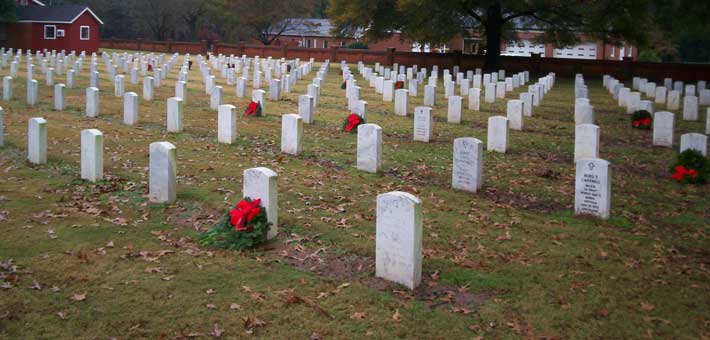 Photo of wreaths decorating graves at Andersonville National Cemetery 