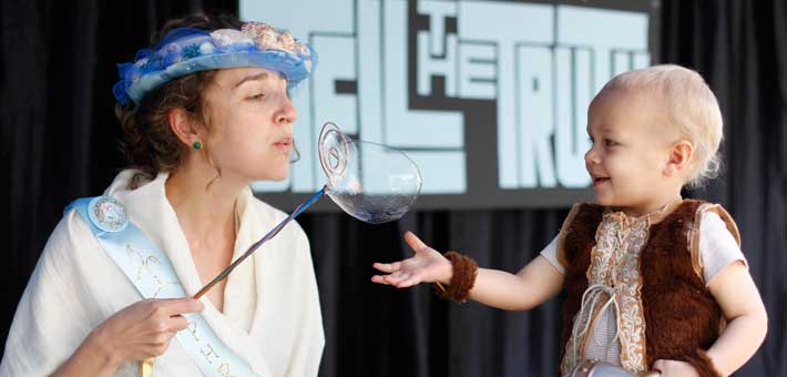 Photo of a woman blowing a bubble at Family Fun Fest at Biscayne National Park