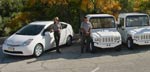 Photo of park rangers with their hybrid vehicles
