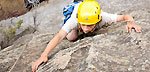 Photo of young climber on cliff