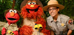 Photo of park ranger with Elmo and Murray of Sesame Street