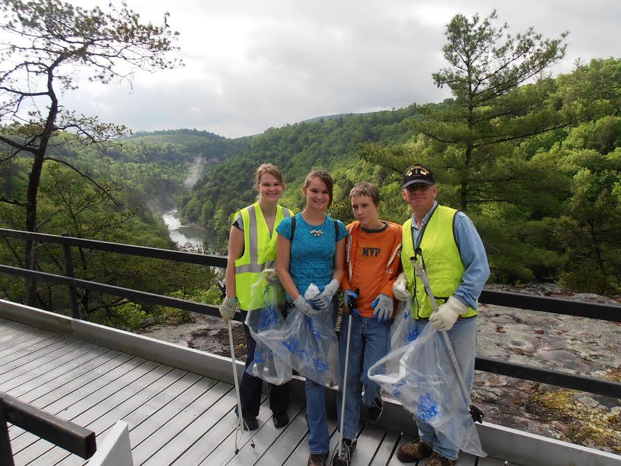 VIPs standing at the Lilly Bluff Overlook