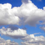 Clouds amidst a blue sky.