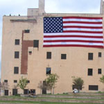 American flag displayed on the side of the museum building