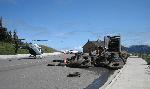 tires, truck and helicopter in parking lot