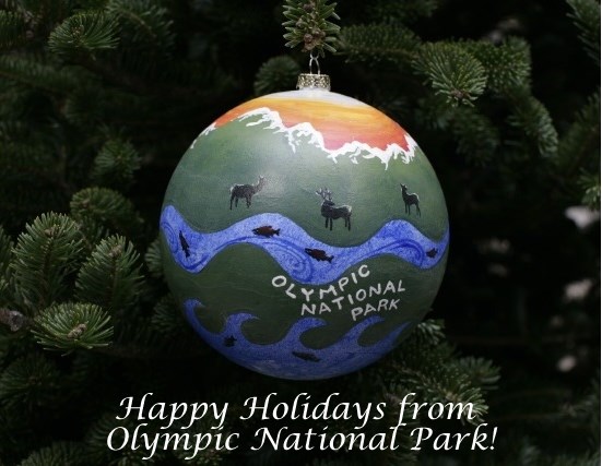 ornament on tree with text "Happy Holidays from Olympic National Park"