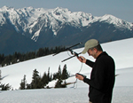 man holding radio antenna