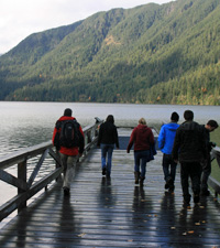 A group walking on the dock at Lake Crescent Lodge