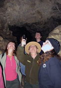A Ranger leads a cave tour A Ranger leads a cave tour