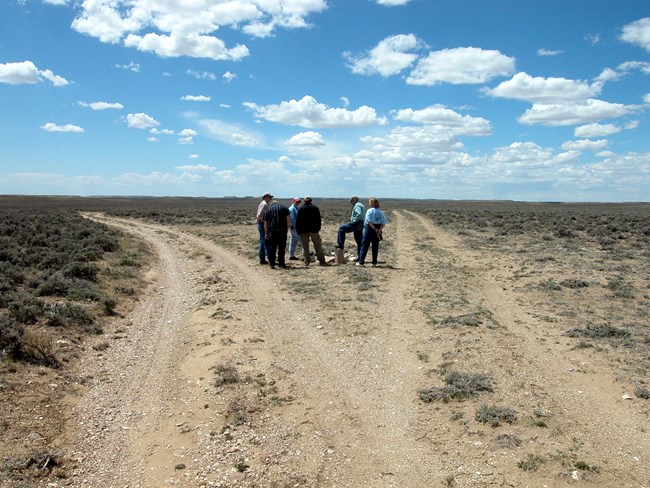Planning team members visit the Part of the Ways junction where California and Oregon trail emigrants separated.