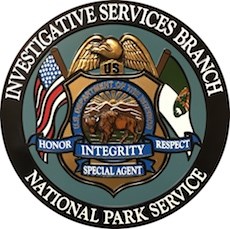 The logo of the NPS Investigative Services Branch.