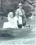 Tricia Nixon in a boat