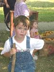 Child re-enacts games of yesteryear.