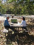 People at picnic table.