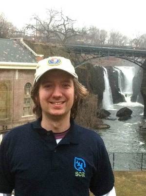 Intern Keith in front of Great Falls of Paterson