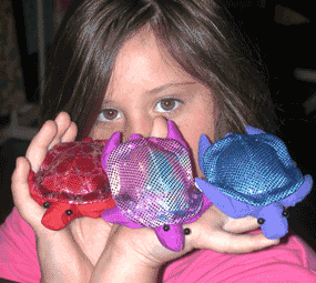 Items for children, such as these sea turtle puppets, can be found in the park's camp store.