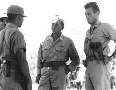 Mitchell, with Filipino guerrilla
