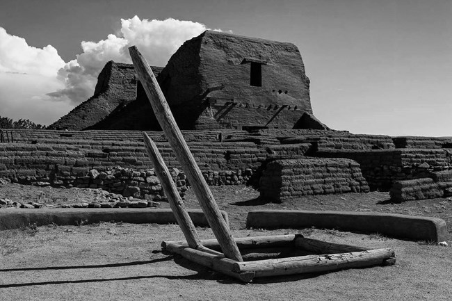 A black and white photo of ancient remains of an ancient building.