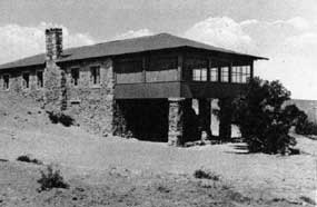 black and white photo of a mostly rock building