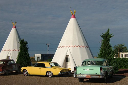 Historic WigWam Motel with vintage cars