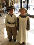 Children in historic clothing at Unilever event