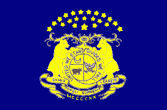 Missouri State Guard flag.  Blue with the Missouri state seal in yellow.  The state seal has two bears holding the seal with the motto, “United we stand, divided we fall.”
