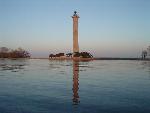 Sunset reflection of the Monument in Lake Erie.