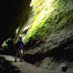 A visitor in one of the talus caves at Pinnacles. Photo by John Dittli