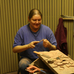 Cultural demonstrator shaping pipestone item