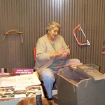 Cultural demonstrator shaping pipestone item