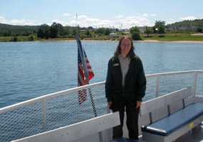 National Park Foundation Interpreter Catherine Kimar aboard the Pictured Rocks Cruises ship Grand Island as the ship readies for Lake Superior.