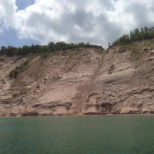The steep sandy slope of the Log Slide, as viewed from Lake Superior.