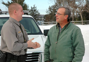 Park Ranger Brad Heyrman with a local resident.