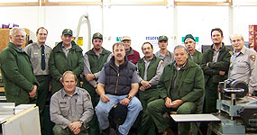 The maintenance staff for Pictured Rocks National lakeshore posed for this photo in the summer 2007.  The photo was taken inside the lakeshore's maintenance building.