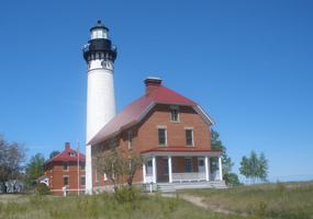 The Au Sable Light Station warns mariners of an offshore reef. 