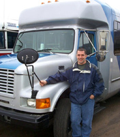 This driver poses with his Altran bus and says ... don't make a fuss - ride the bus!