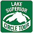 The green and white Lake Superior Circle Tour logo shows the outline of this greatest lake.