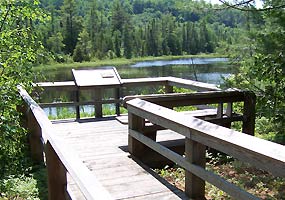 The Sand Point Marsh Trail is a half-mile long disabled accessible nature trail. The Sand Point Marsh Trail is a half-mile long disabled accessible nature trail.