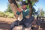 Ranger making fire with a hand drill.