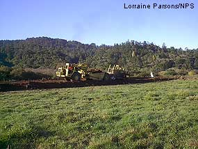Earth Mover Removing Levee