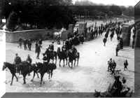 The 51st Iowa Volunteer Infantry Regiment passes through the Lombard Gate on the way to the Philippines.