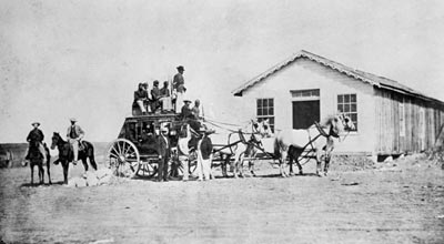 Black troops guard a U.S. Express Stage.