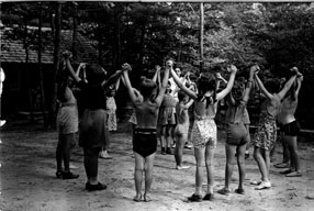 children in circle holding hands