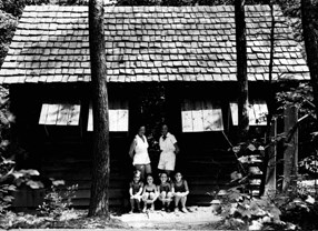 1930s cabin with campers