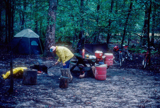 Cooking over a campfire.