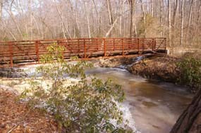 A bridge crossing over Quantico Creek leading to North Valley Trail and the old Cabin Branch Mine site.