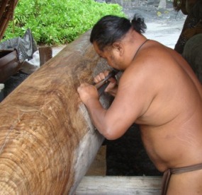 Charlie Grace Resurfacing the Naopio, koa wood canoe